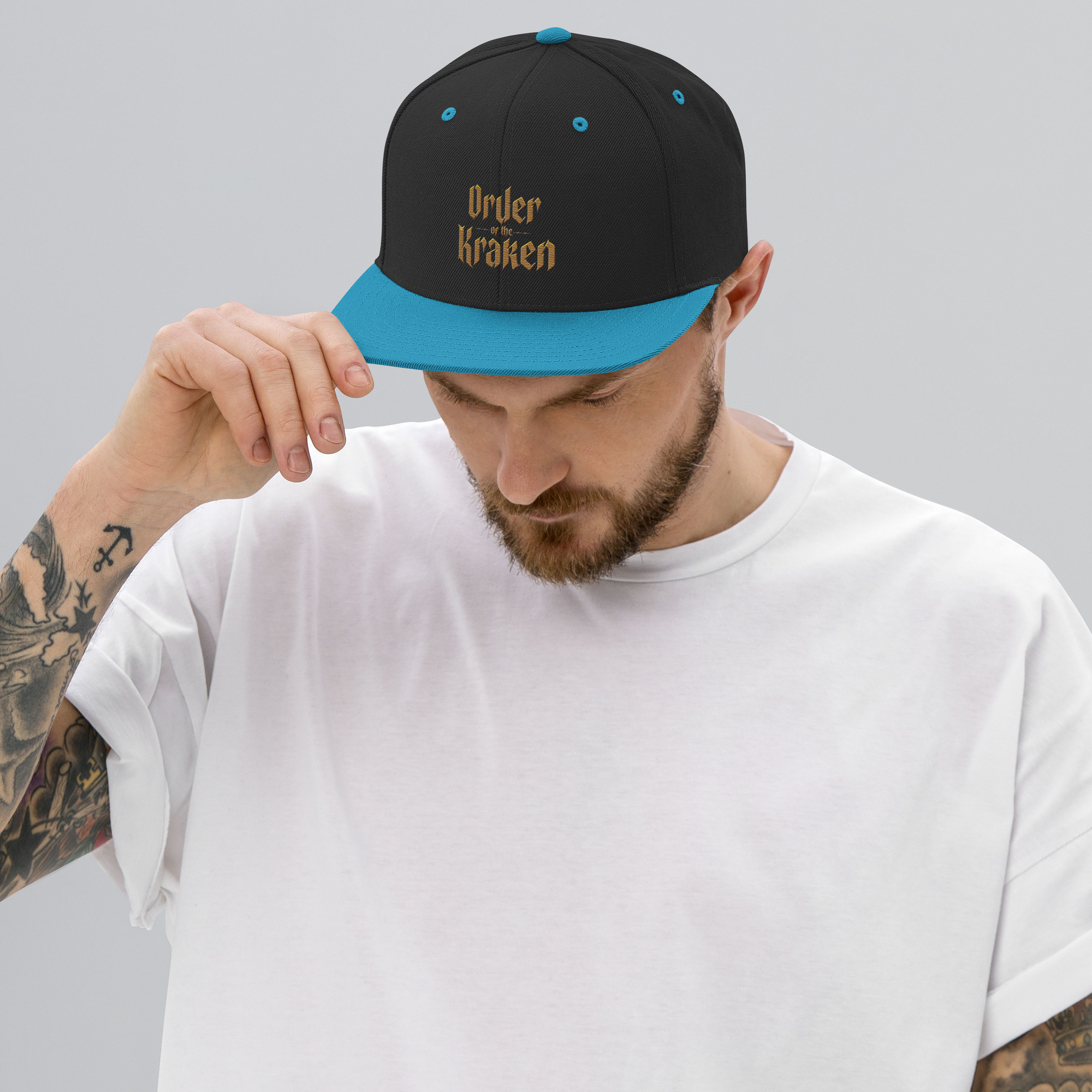 classic-snapback-black-teal-front-653683d073792.jpg